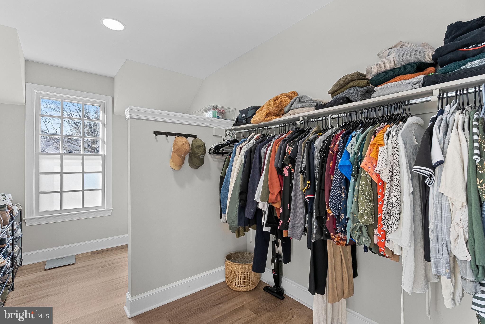 9440 Flowerden Lane Manassas, VA 20110 - Photo 36 of 66 a view of walk in closet with clothes