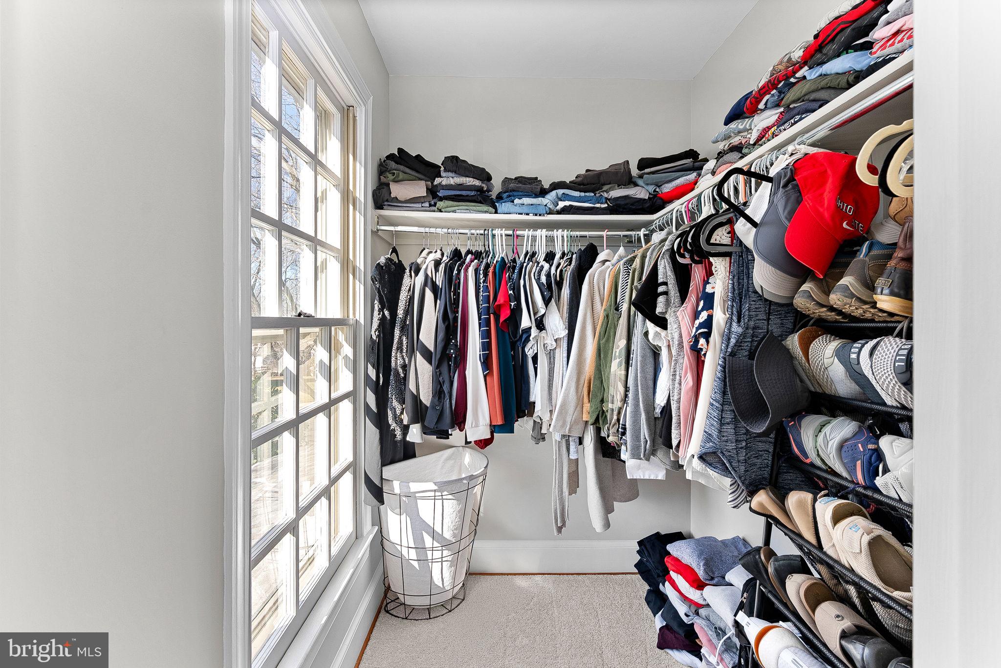 9440 Flowerden Lane Manassas, VA 20110 - Photo 39 of 66 a view of walk in closet with clothes