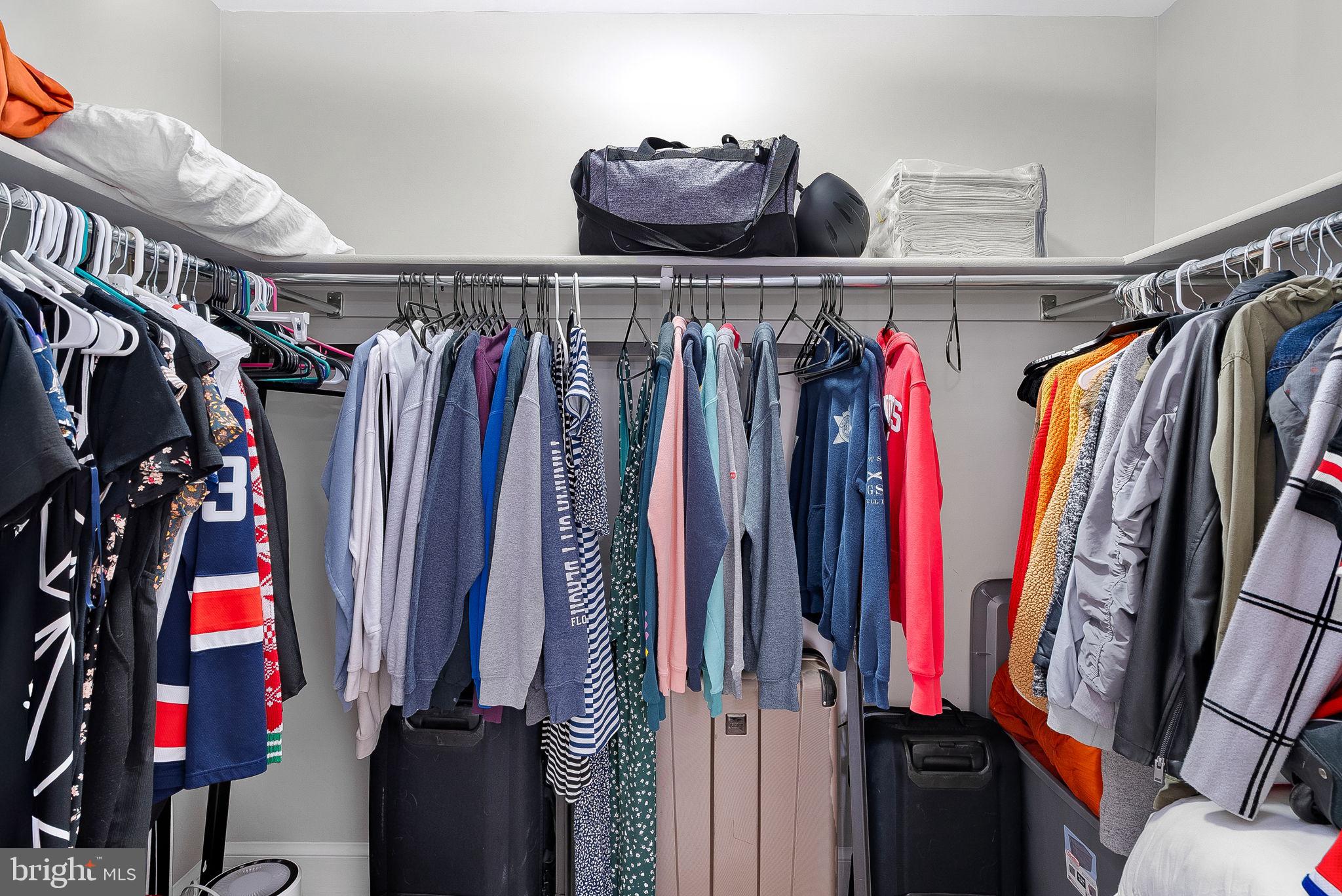 9440 Flowerden Lane Manassas, VA 20110 - Photo 42 of 66 a view of walk in closet with clothes