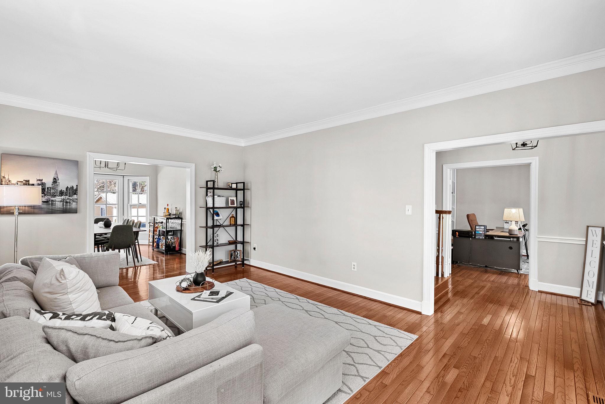 9440 Flowerden Lane Manassas, VA 20110 - Photo 5 of 66 a living room with furniture and wooden floor