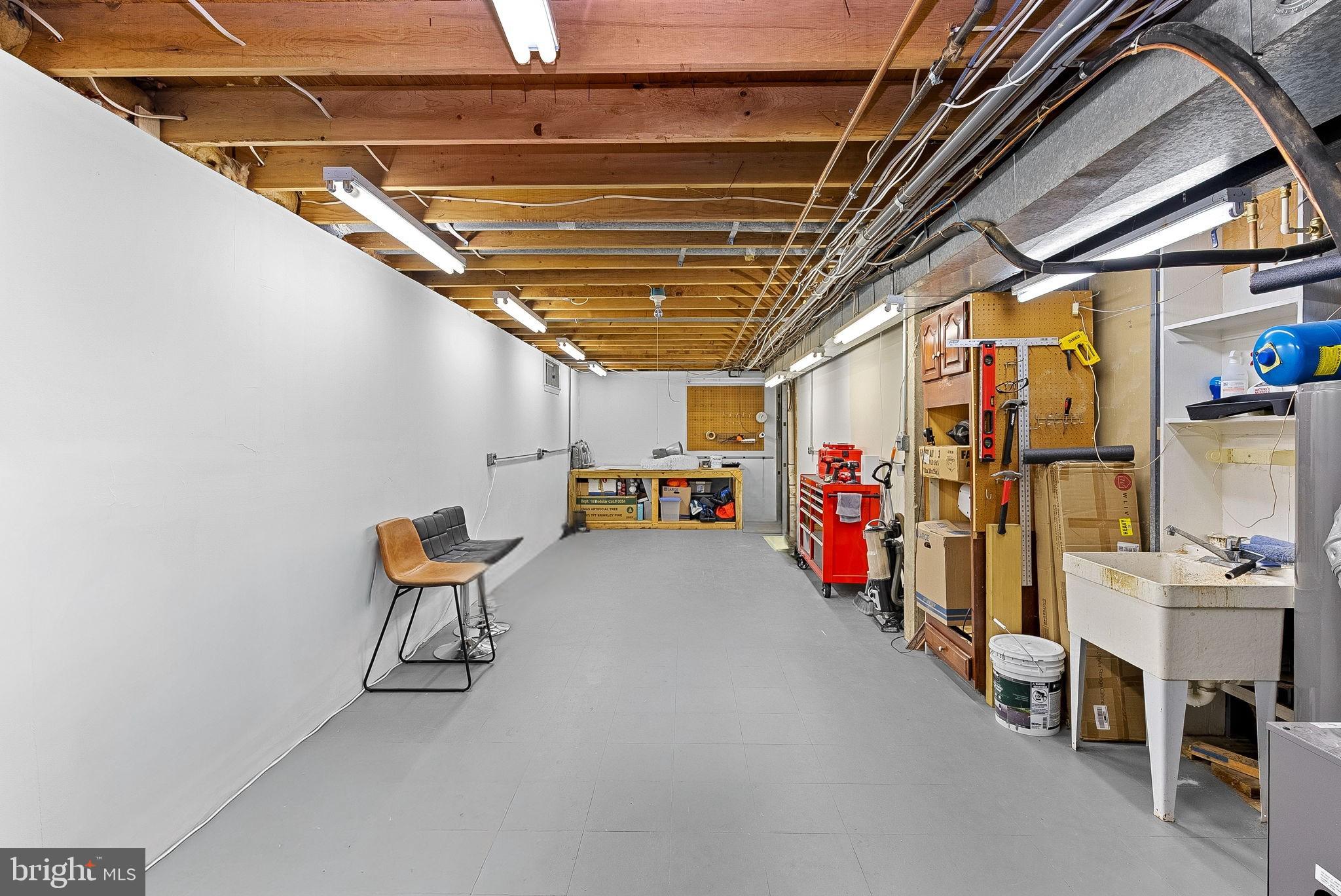 9440 Flowerden Lane Manassas, VA 20110 - Photo 55 of 66 a view of storage and utility room