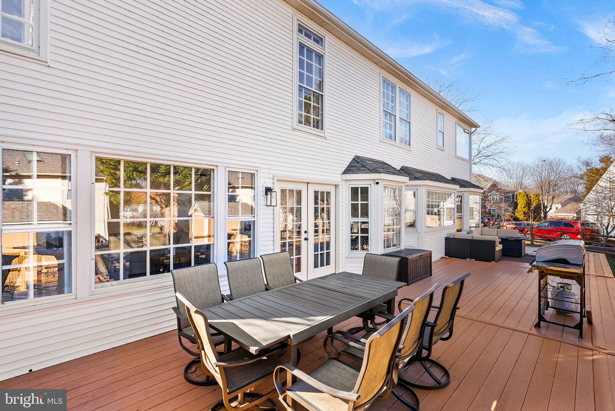 9440 Flowerden Lane Manassas, VA 20110 - Photo 61 of 66 a outdoor space with patio furniture and wooden floor