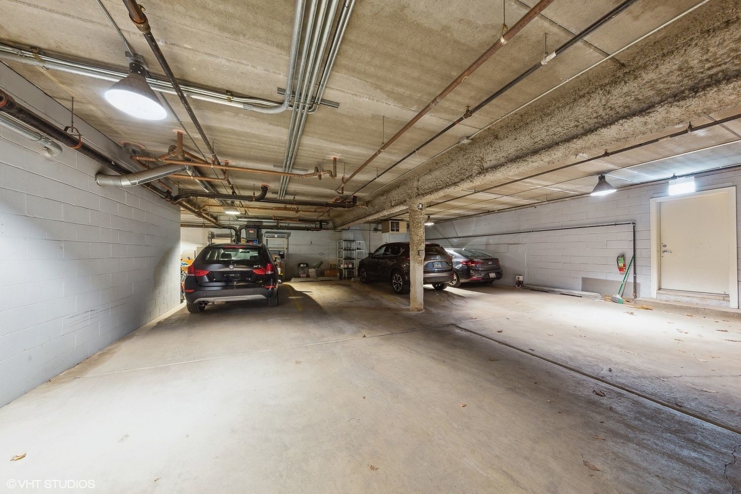 825 North Hudson Avenue, Unit 2B Chicago, IL 60610 - Photo 17 of 17 a view of parking garage with car