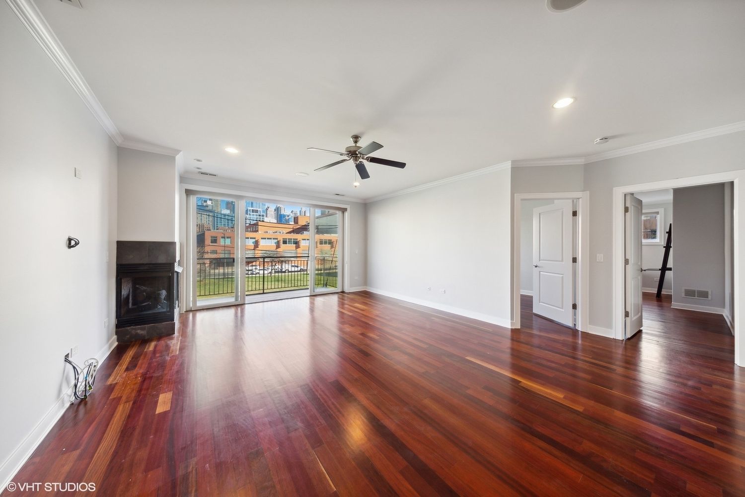 825 North Hudson Avenue, Unit 2B Chicago, IL 60610 - Photo 5 of 17 a view of an empty room with wooden floor