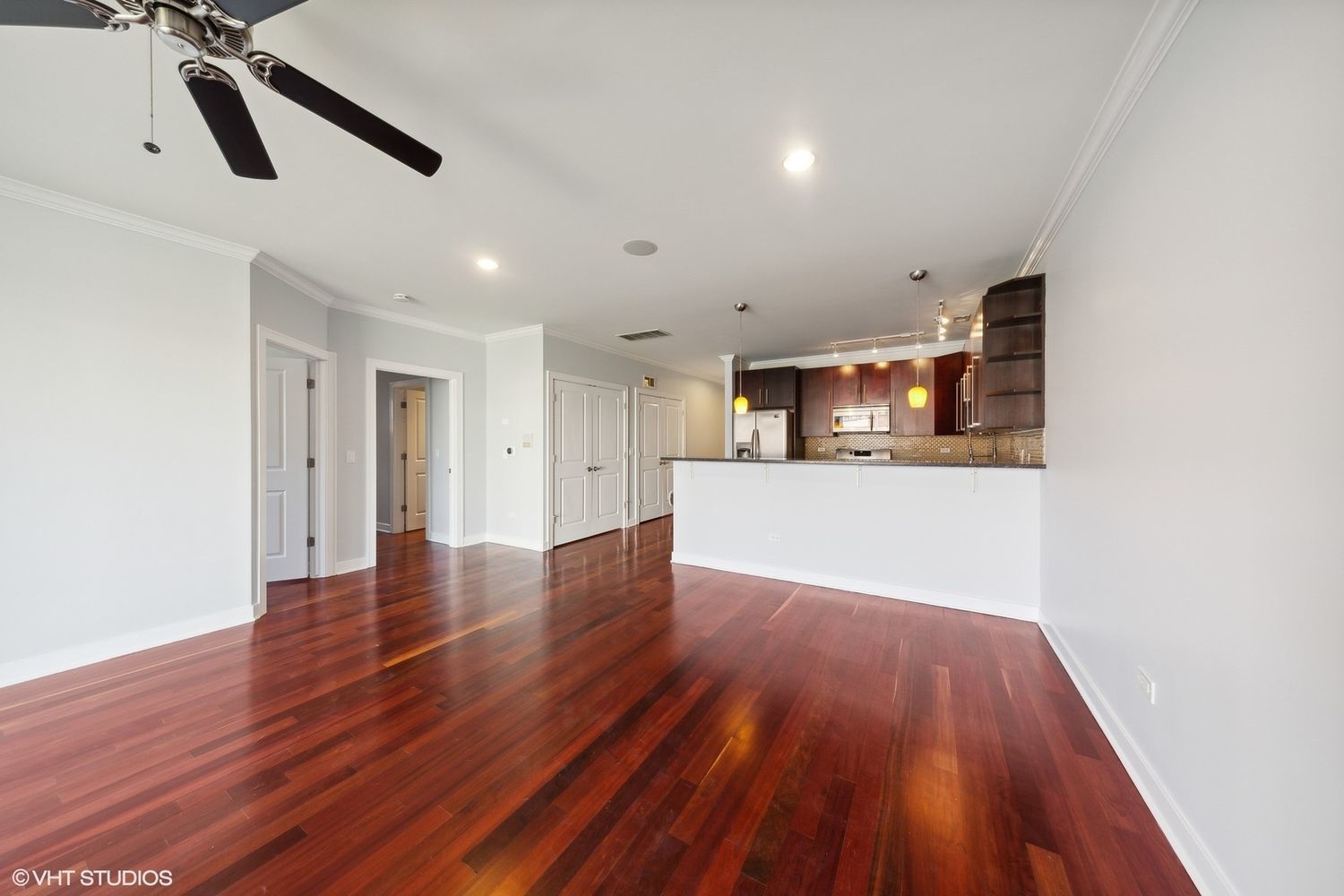 825 North Hudson Avenue, Unit 2B Chicago, IL 60610 - Photo 6 of 17 a view of empty room with wooden floor