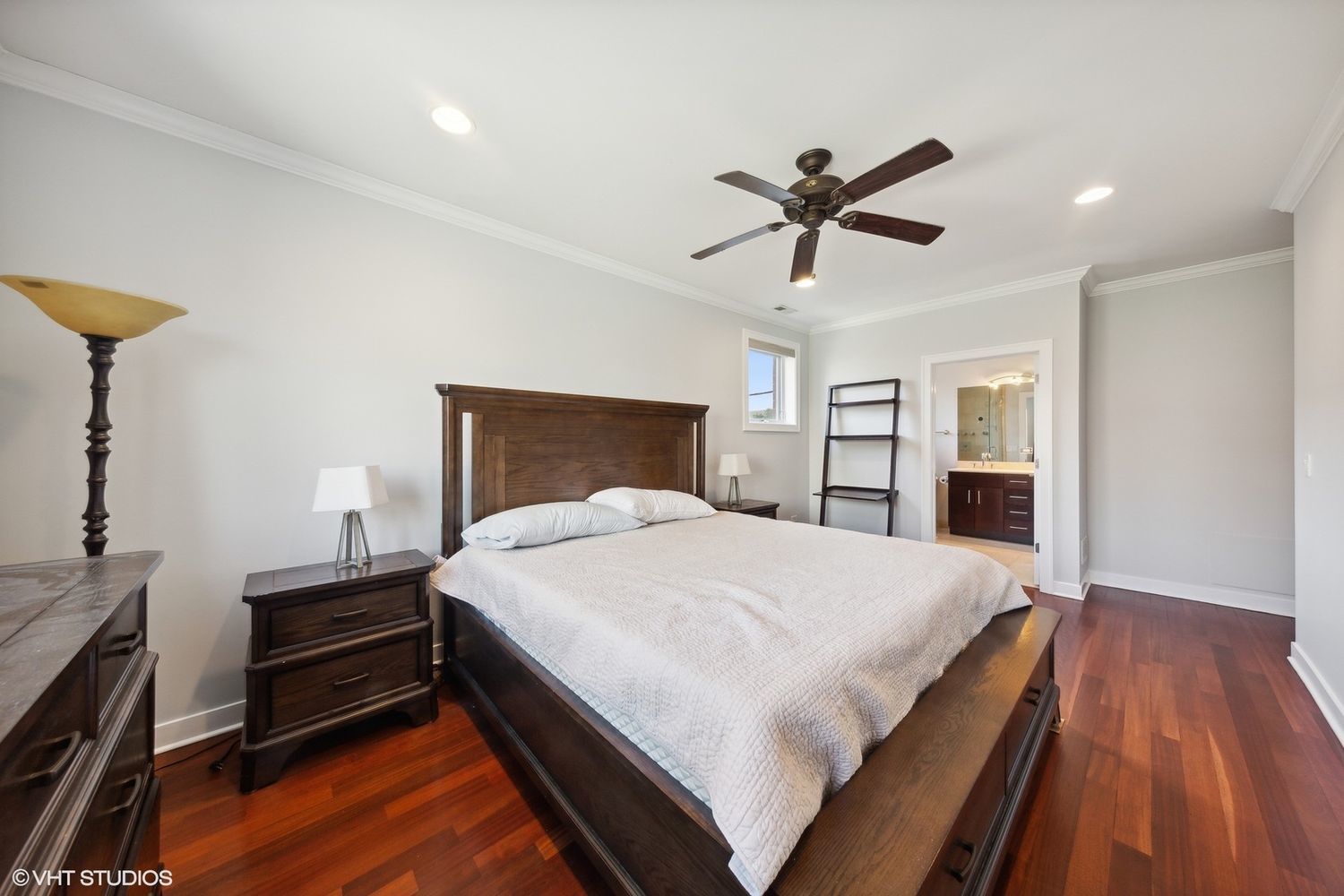 825 North Hudson Avenue, Unit 2B Chicago, IL 60610 - Photo 9 of 17 a bedroom with a bed and a chandelier