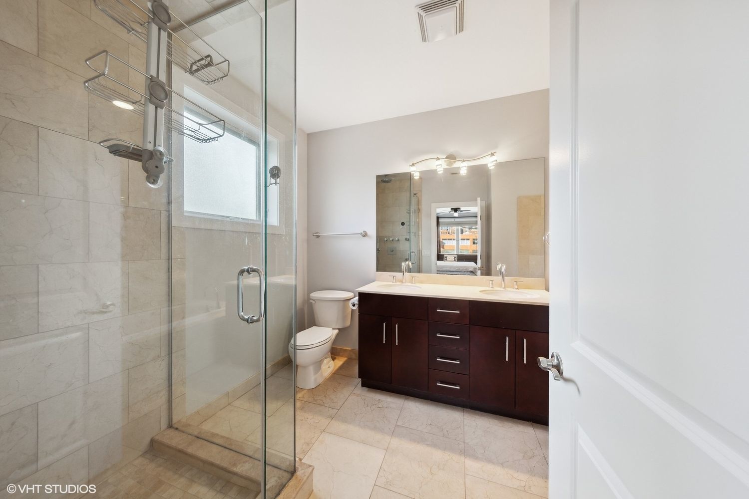 825 North Hudson Avenue, Unit 2B Chicago, IL 60610 - Photo 10 of 17 a bathroom with a sink and a mirror