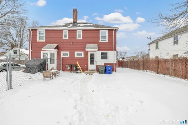 a view of a building with a snow