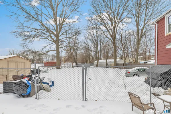 a view of a backyard of snow
