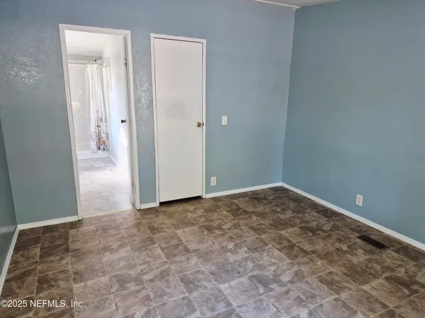 a view of a room with a sink