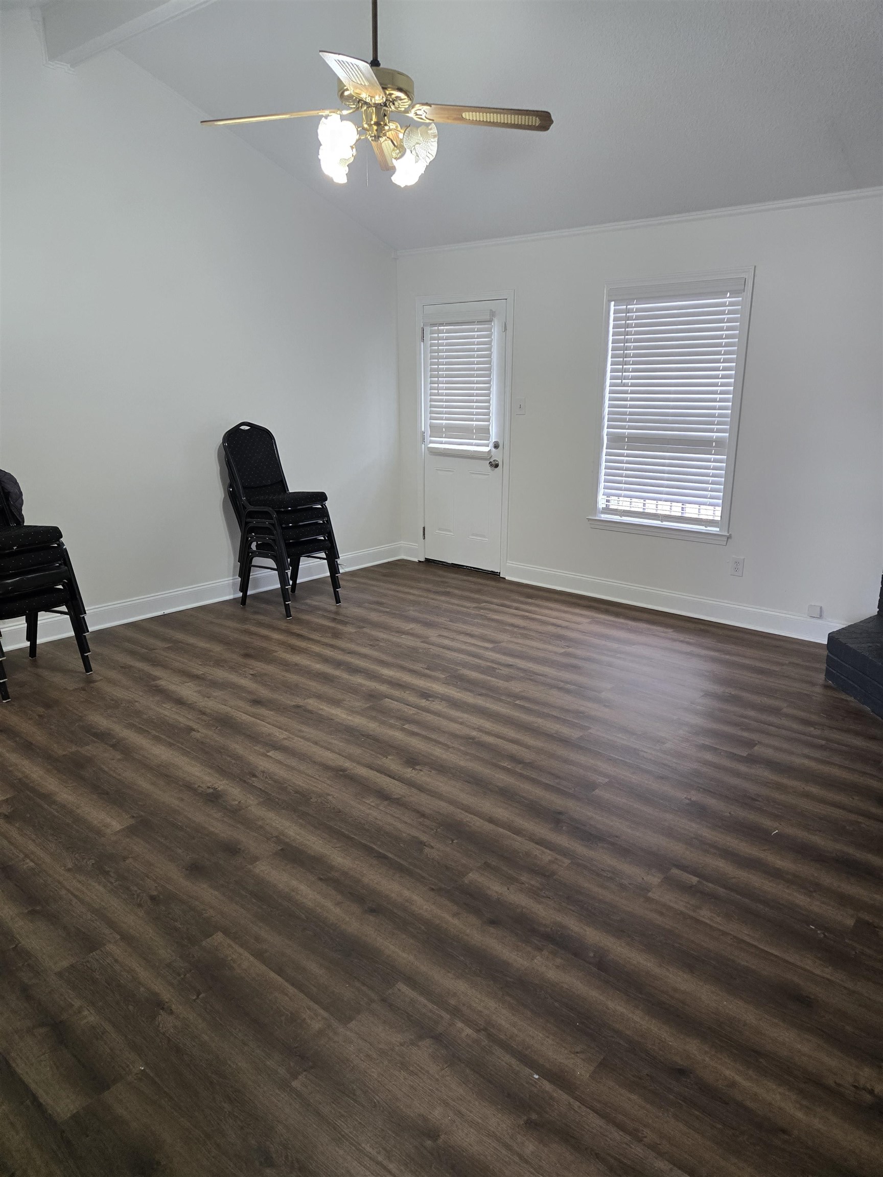 3856 Innsbrook Drive Memphis, TN 38115 - Photo 4 of 11 a view of an empty room with a window and wooden floor