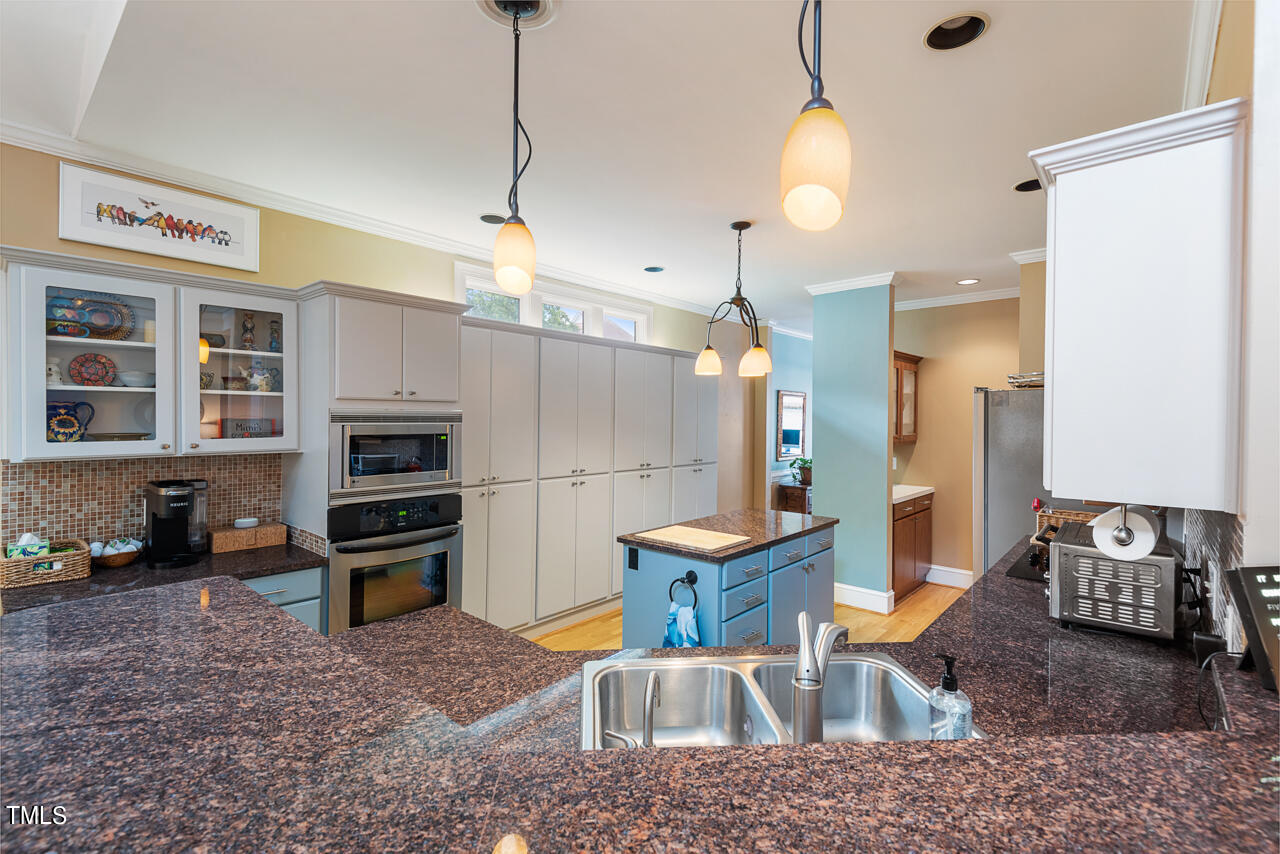 2905 Hawtree Drive Raleigh, NC 27613 - Photo 14 of 51 kitchen view from the bar