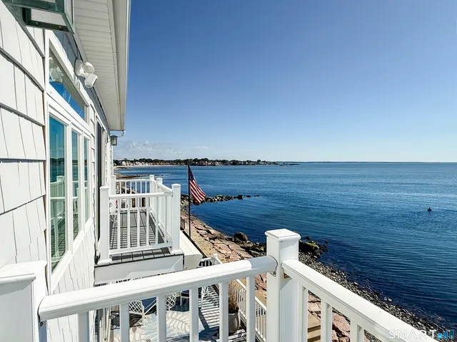 a view of an ocean from a balcony