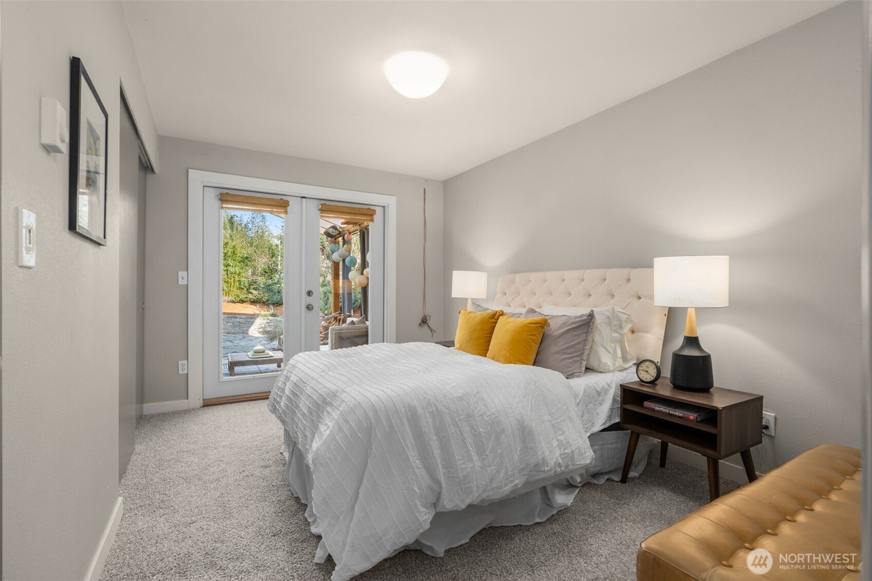 6528 23rd Avenue Southwest Seattle, WA 98106 - Photo 11 of 39 a bedroom with a bed and window