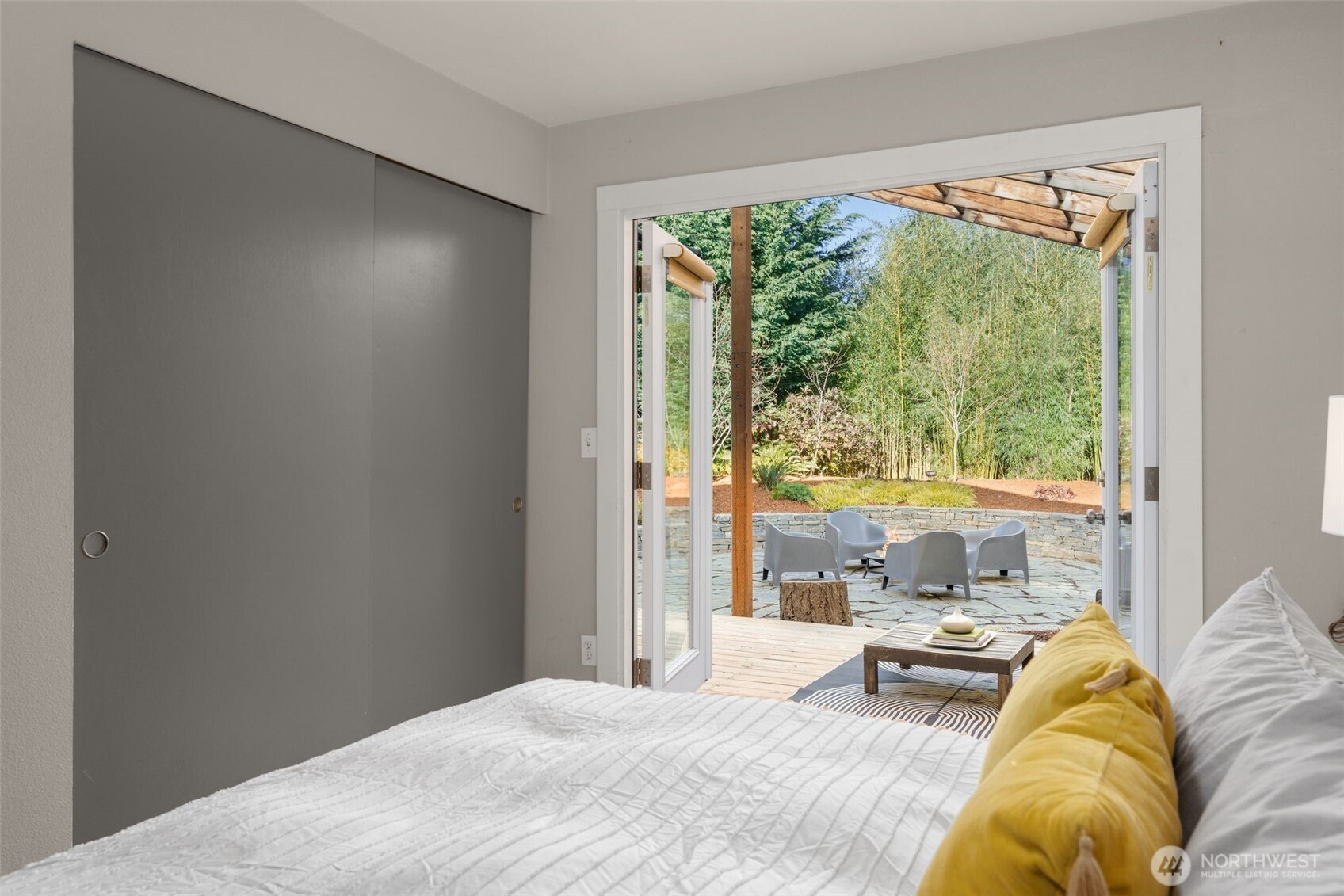 6528 23rd Avenue Southwest Seattle, WA 98106 - Photo 12 of 39 a bedroom with a bed and a large window