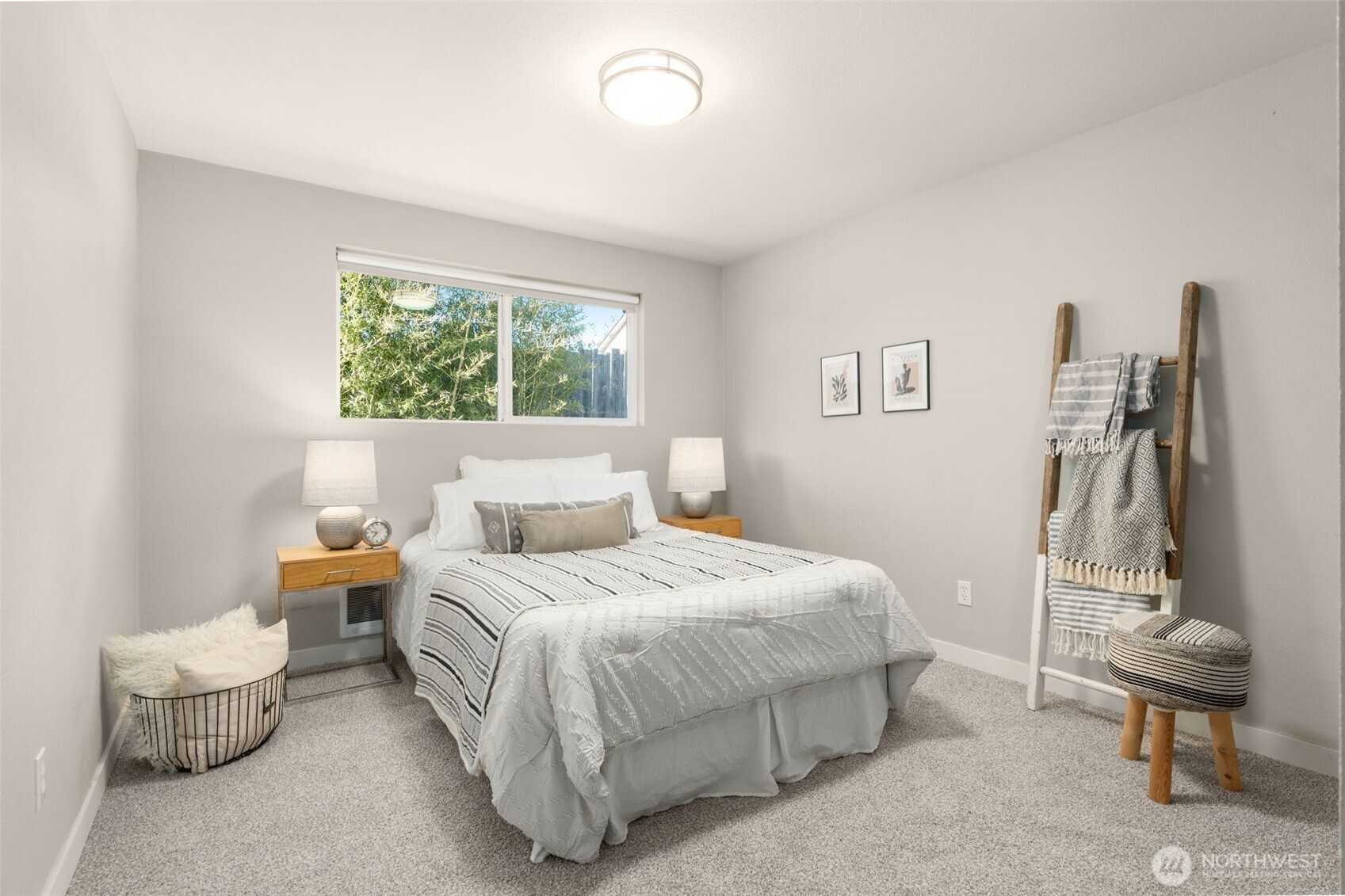 6528 23rd Avenue Southwest Seattle, WA 98106 - Photo 17 of 39 a bedroom with a bed and a window