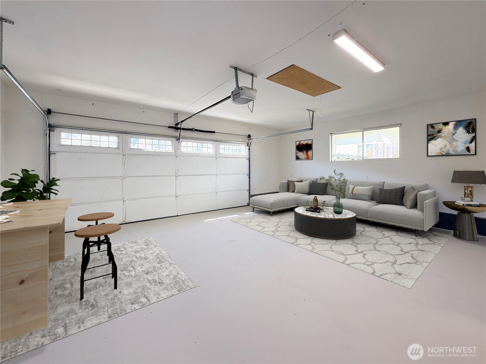 6528 23rd Avenue Southwest Seattle, WA 98106 - Photo 19 of 39 a living room with furniture and a rug