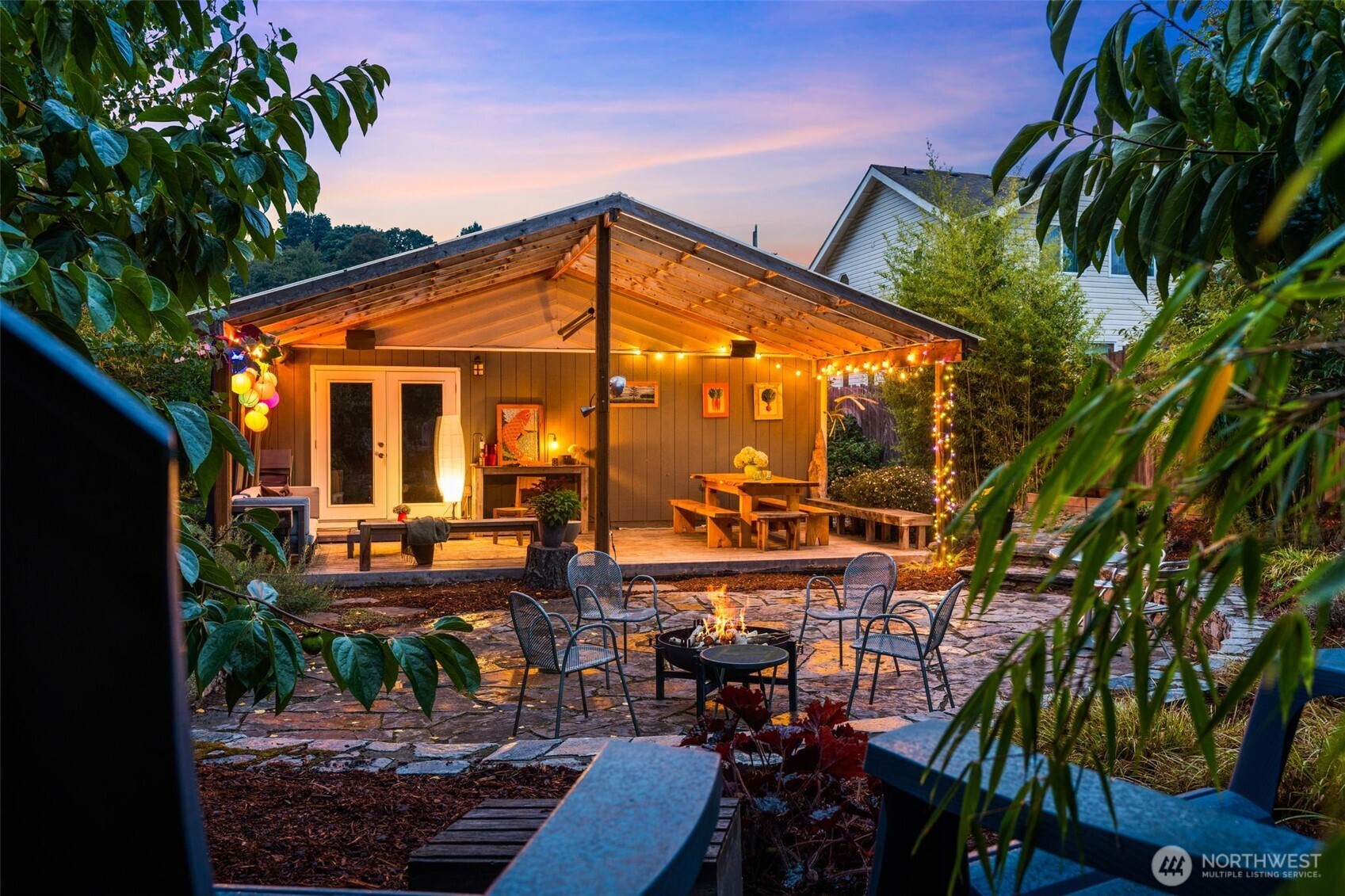 6528 23rd Avenue Southwest Seattle, WA 98106 - Photo 2 of 39 a view of a chairs and table in a backyard