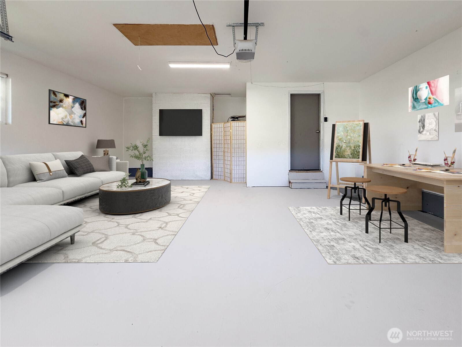 6528 23rd Avenue Southwest Seattle, WA 98106 - Photo 21 of 39 a living room with furniture and a flat screen tv