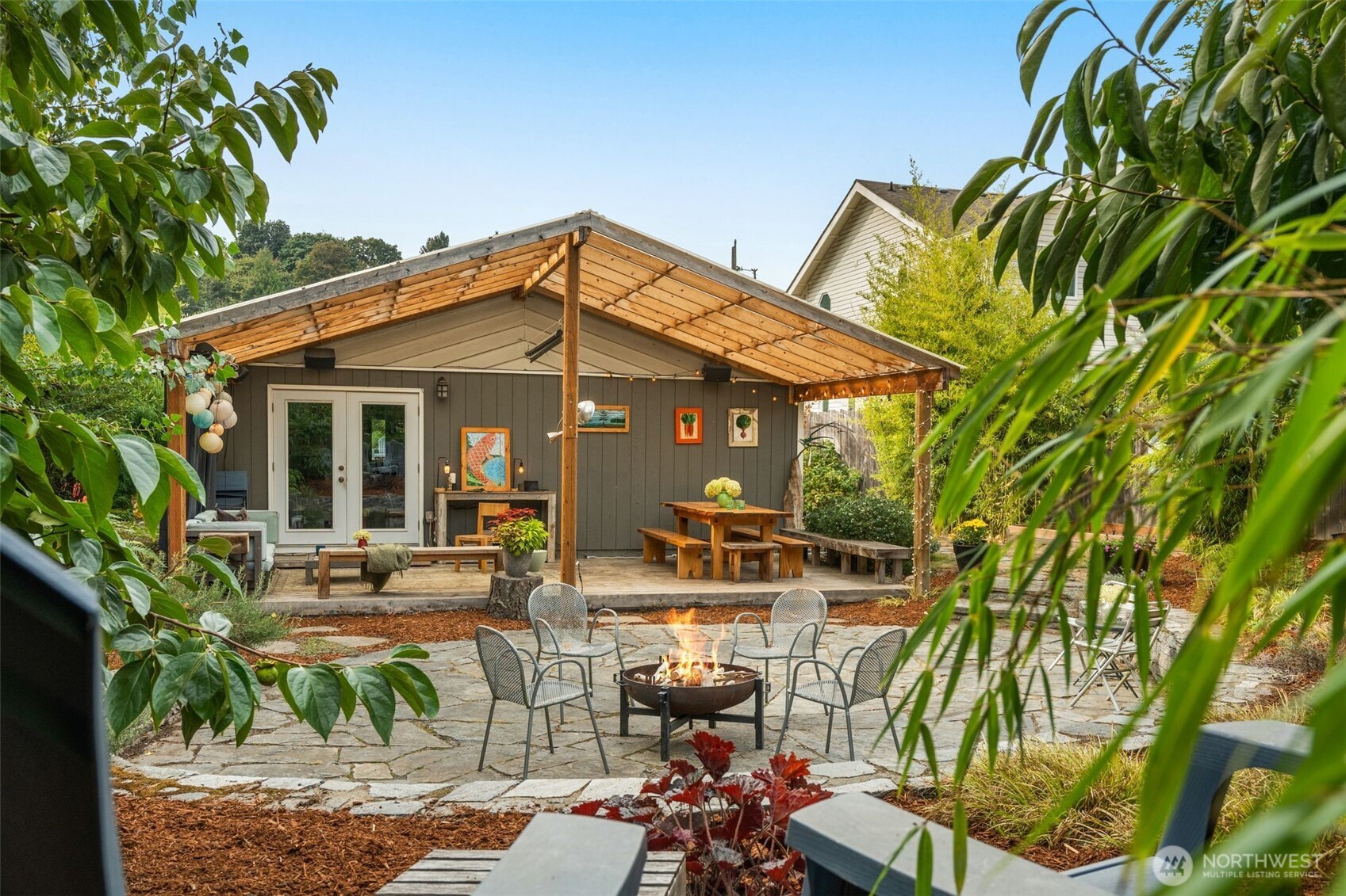 6528 23rd Avenue Southwest Seattle, WA 98106 - Photo 25 of 39 a front view of house with yard and seating area