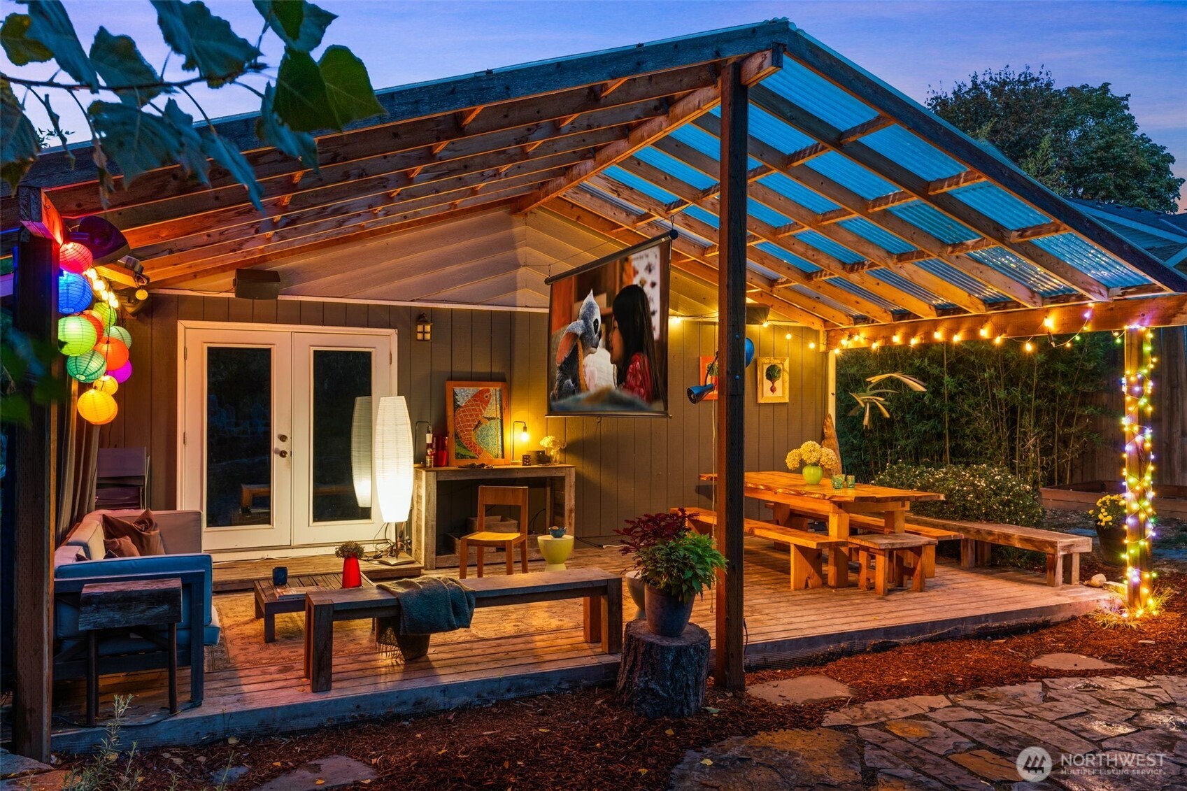 6528 23rd Avenue Southwest Seattle, WA 98106 - Photo 29 of 39 a view of the patio with chairs and tables