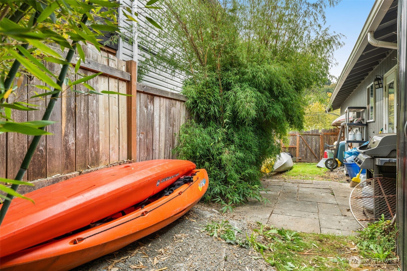 6528 23rd Avenue Southwest Seattle, WA 98106 - Photo 35 of 39 a backyard of a house with outdoor seating