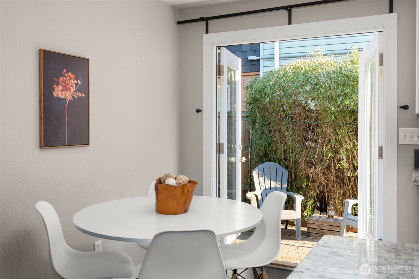 6528 23rd Avenue Southwest Seattle, WA 98106 - Photo 7 of 39 a view of a dining room with furniture and a window