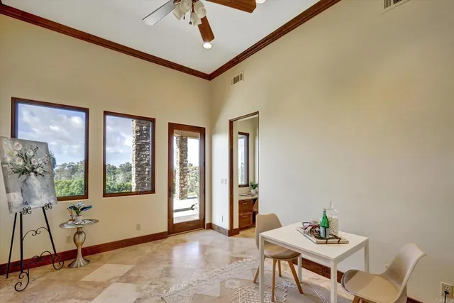 a living room with furniture and windows