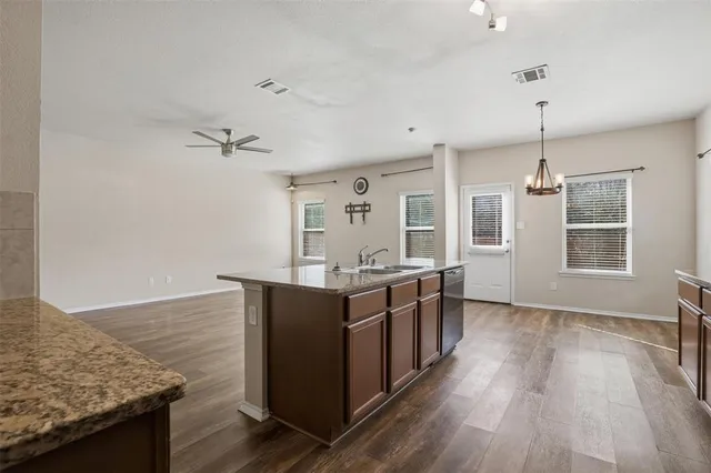 an aerial view of a water and trees