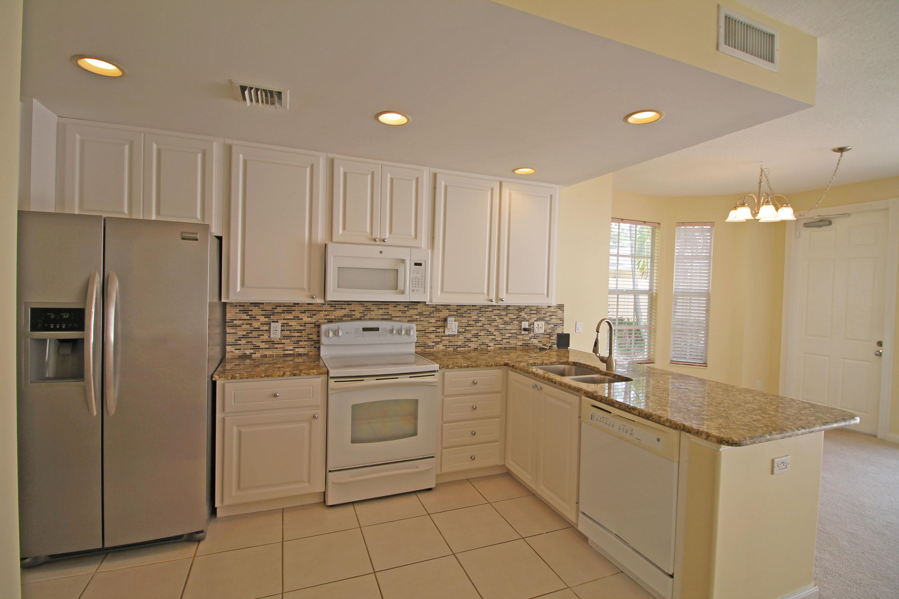 1881 Frederick Small Road Jupiter, FL 33458 - Photo 24 of 32 Kitchen1