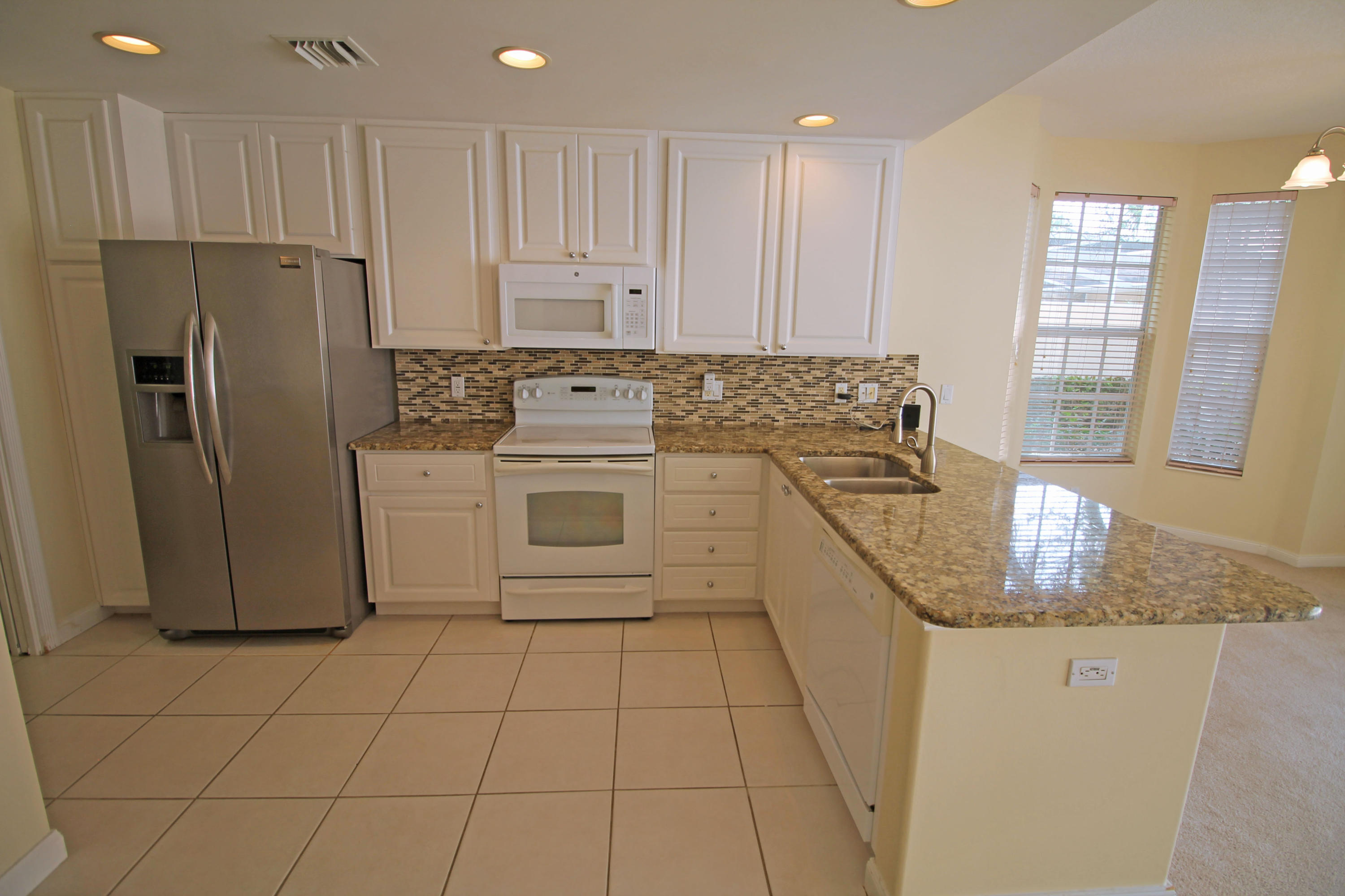 1881 Frederick Small Road Jupiter, FL 33458 - Photo 25 of 32 Kitchen2