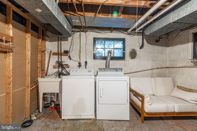 a utility room with dryer and washer