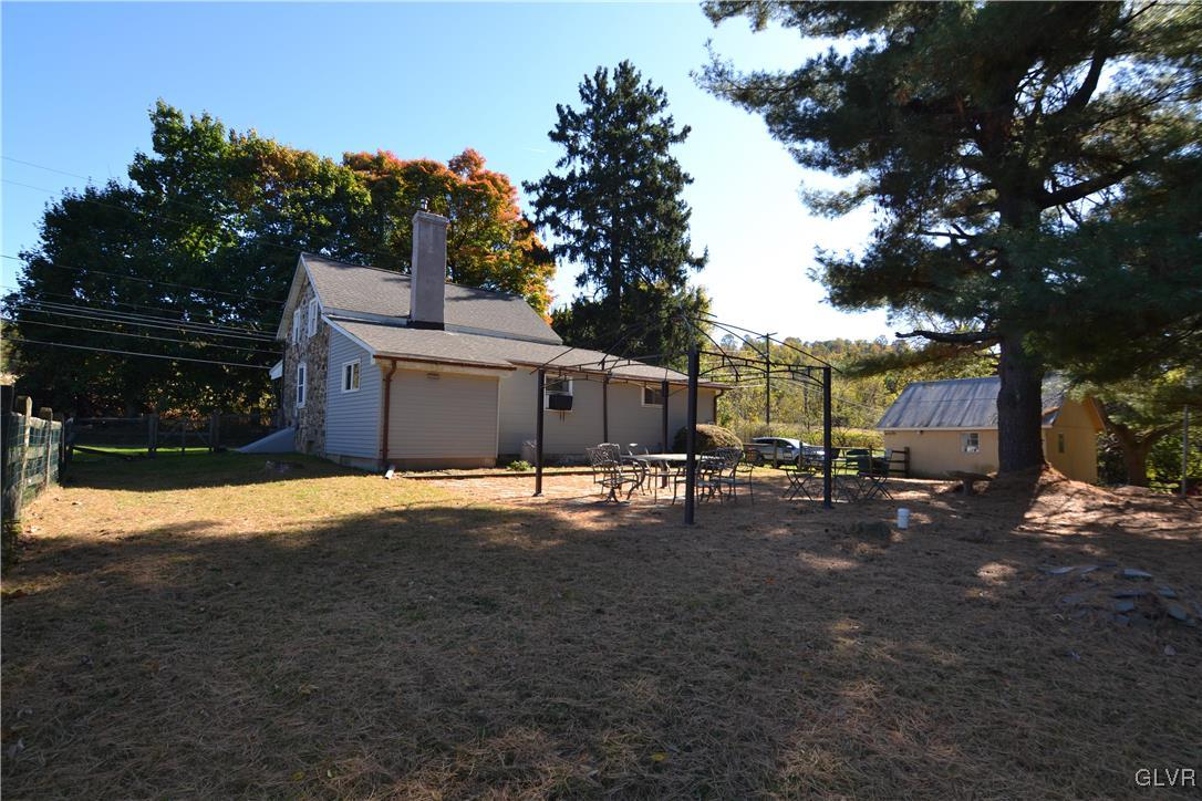 315 Berger Road Easton, PA 18042 - Photo 13 of 39 a view of a house with a yard and sitting area
