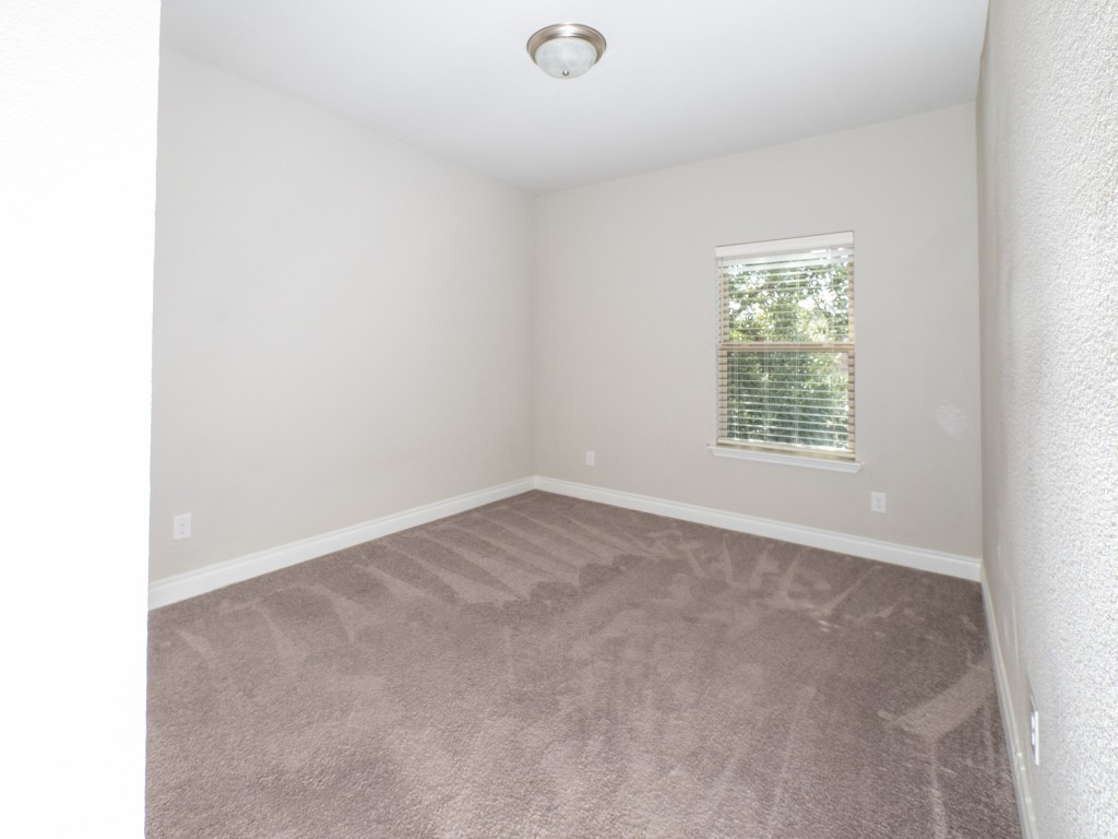 2001 Limestone Lake Drive Georgetown, TX 78633 - Photo 30 of 40 an empty room with a window