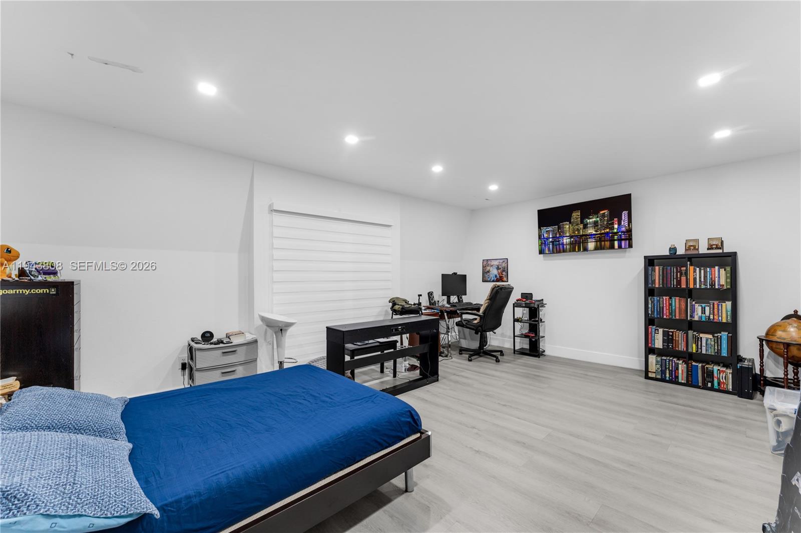 13835 Southwest 84th Street, Unit 503 Miami, FL 33183 - Photo 15 of 32 a living room with furniture and a wooden floor