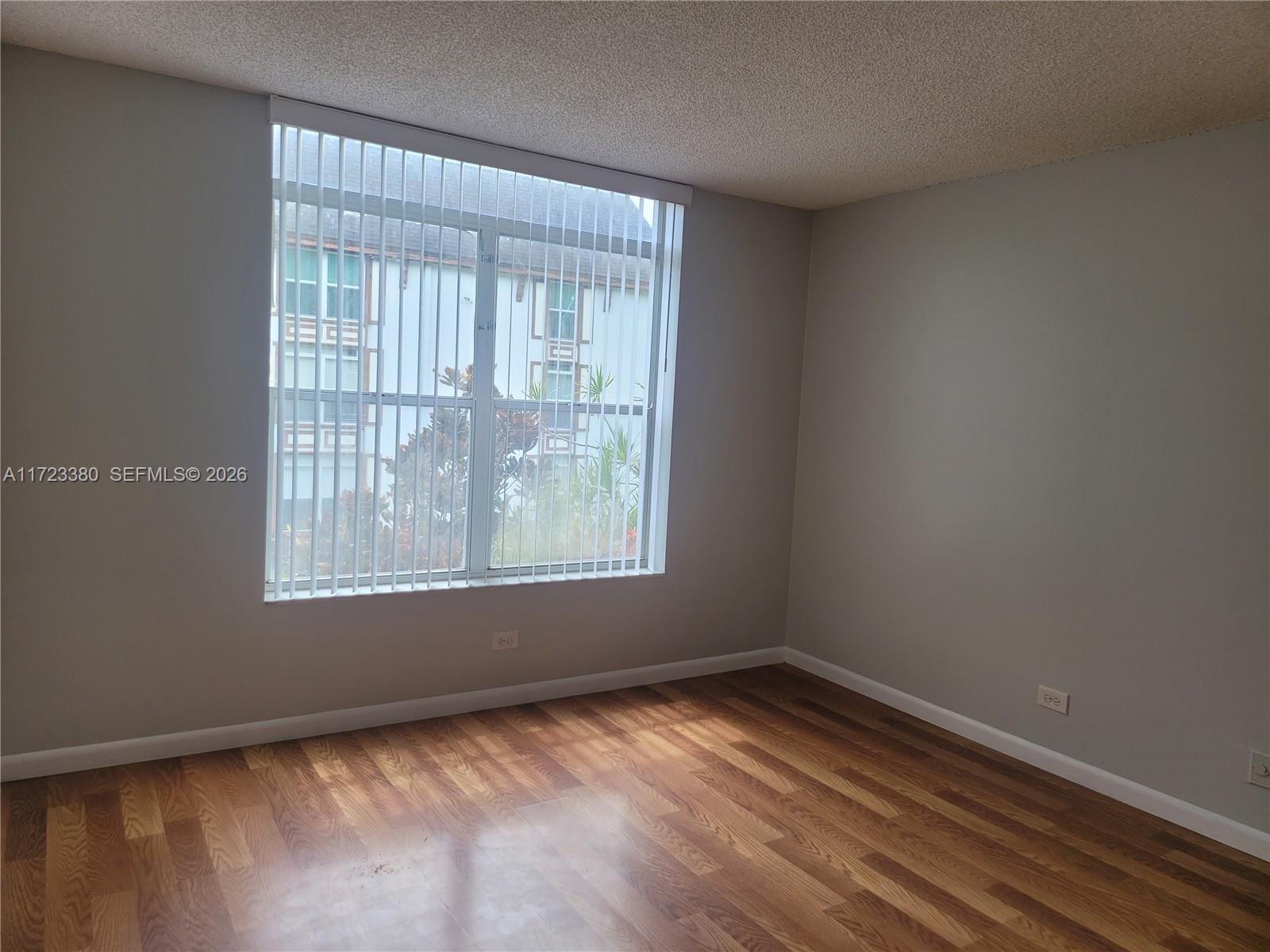 3750 Inverrary Drive, Unit 2Y Lauderhill, FL 33319 - Photo 11 of 44 an empty room with a window