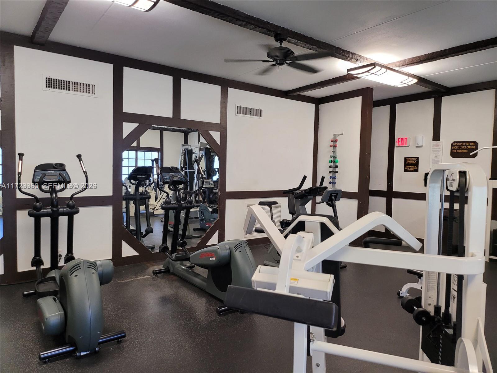 3750 Inverrary Drive, Unit 2Y Lauderhill, FL 33319 - Photo 30 of 44 a view of a room with gym equipment