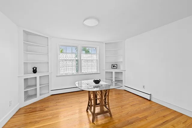 a room with windows and tables