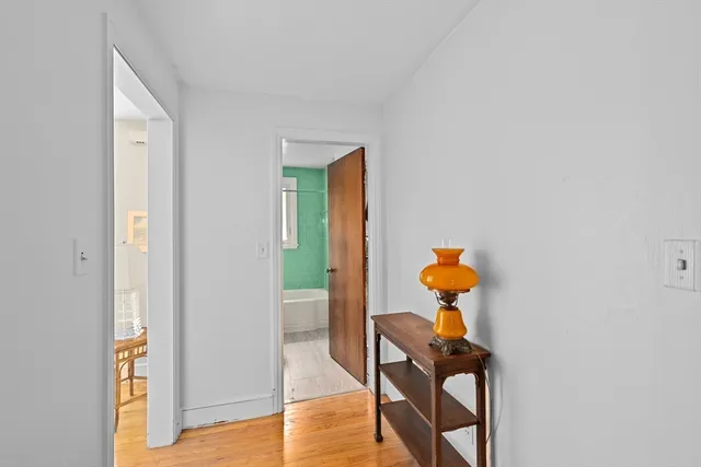 a view of workspace with wooden floor
