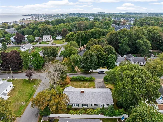an aerial view of a house with a garden