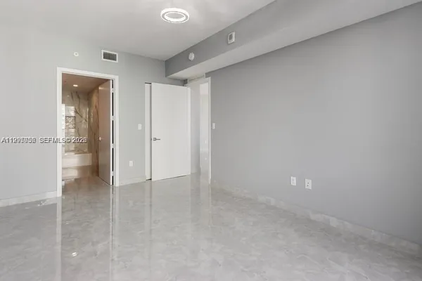 a view of a kitchen with a sink