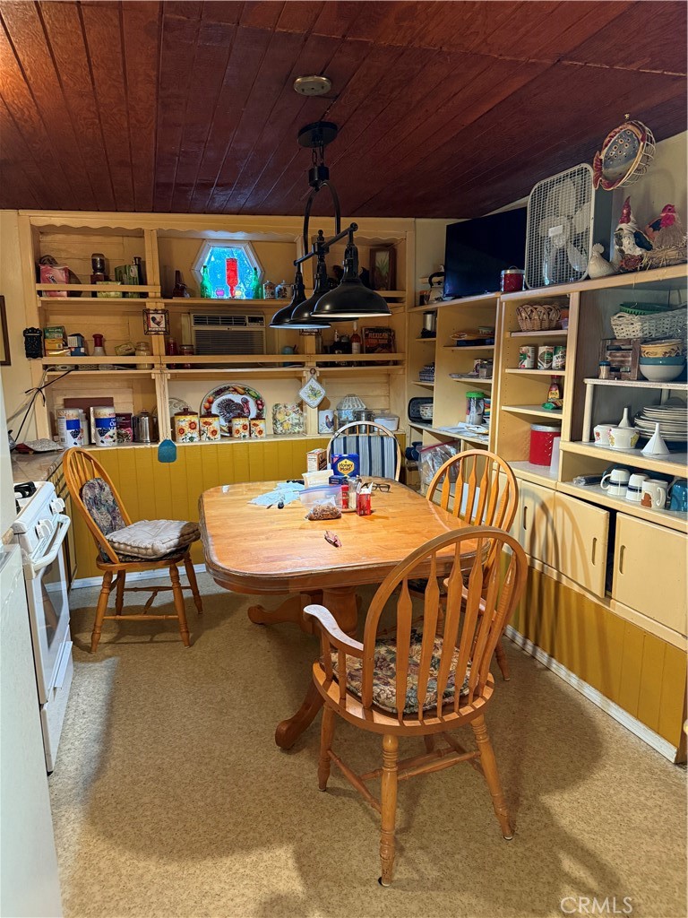 1510 West Merrill Avenue Rialto, CA 92376 - Photo 5 of 6 a outdoor dining space with furniture and flat screen tv