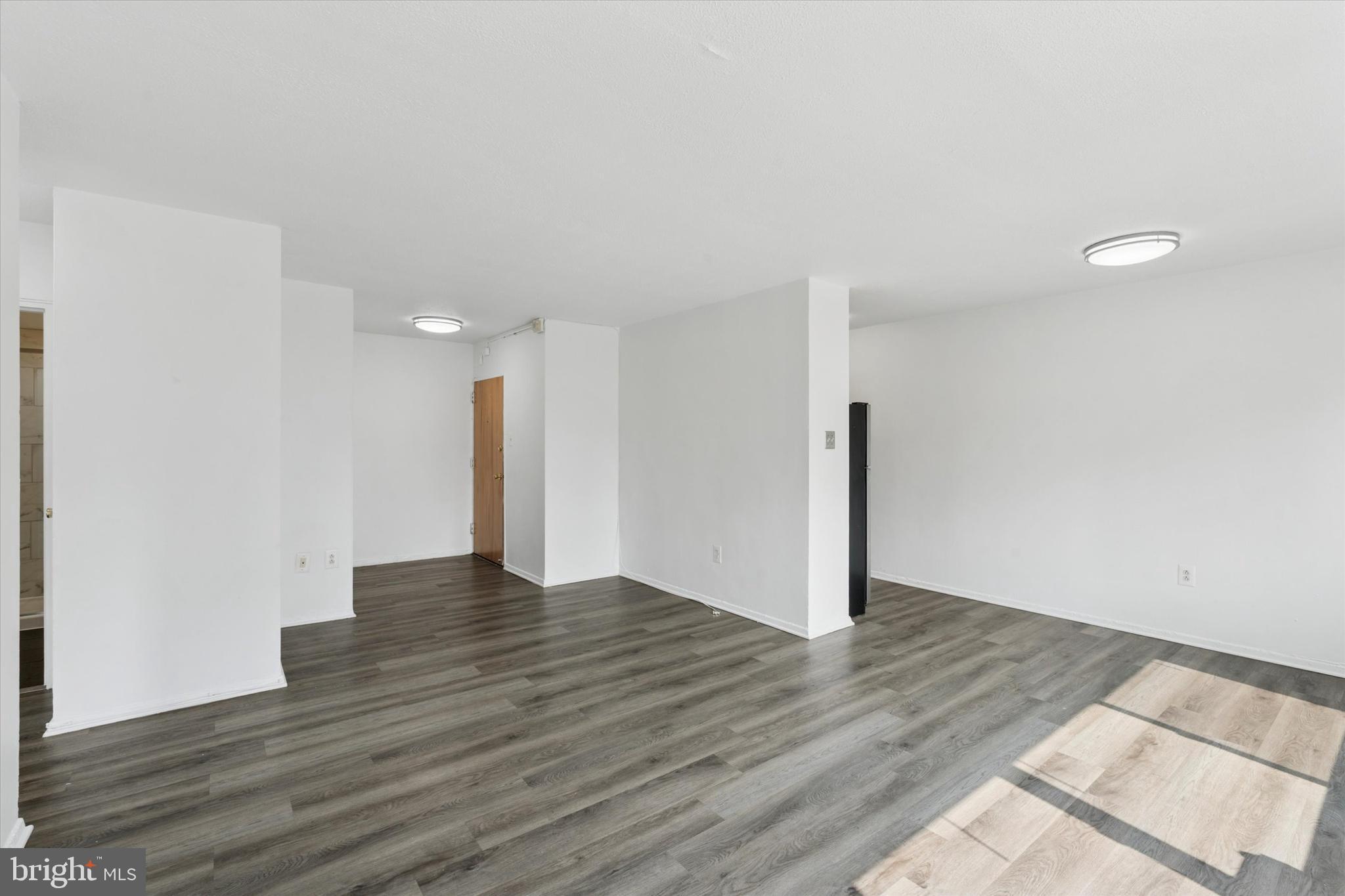 2101 Chestnut Street, Unit 1208 Philadelphia, PA 19103 - Photo 2 of 15 a view of empty room with wooden floor