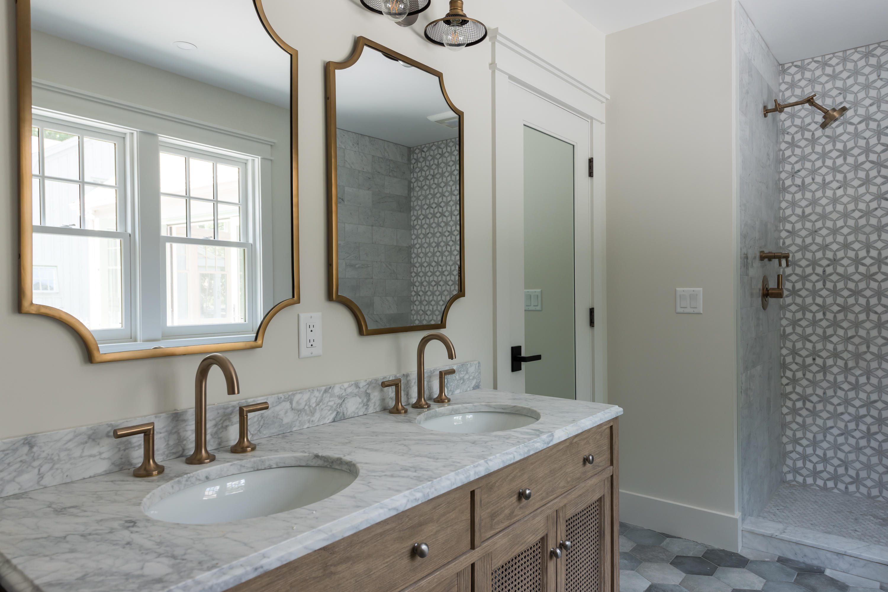 10 Eel River Road Osterville, MA 02655 - Photo 22 of 36 a bathroom with double sink and a mirror