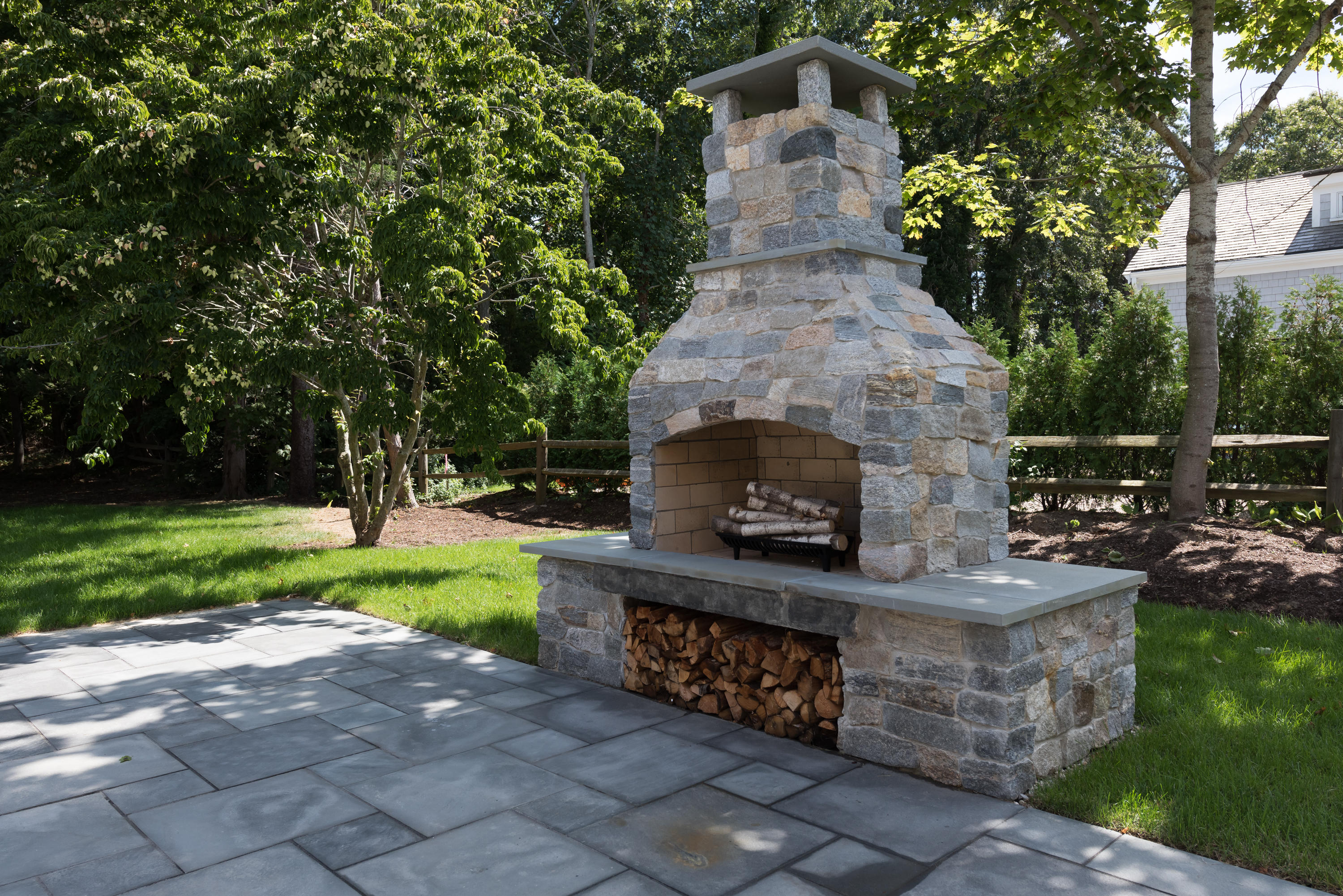 10 Eel River Road Osterville, MA 02655 - Photo 8 of 36 a front view of a house with garden and flowers