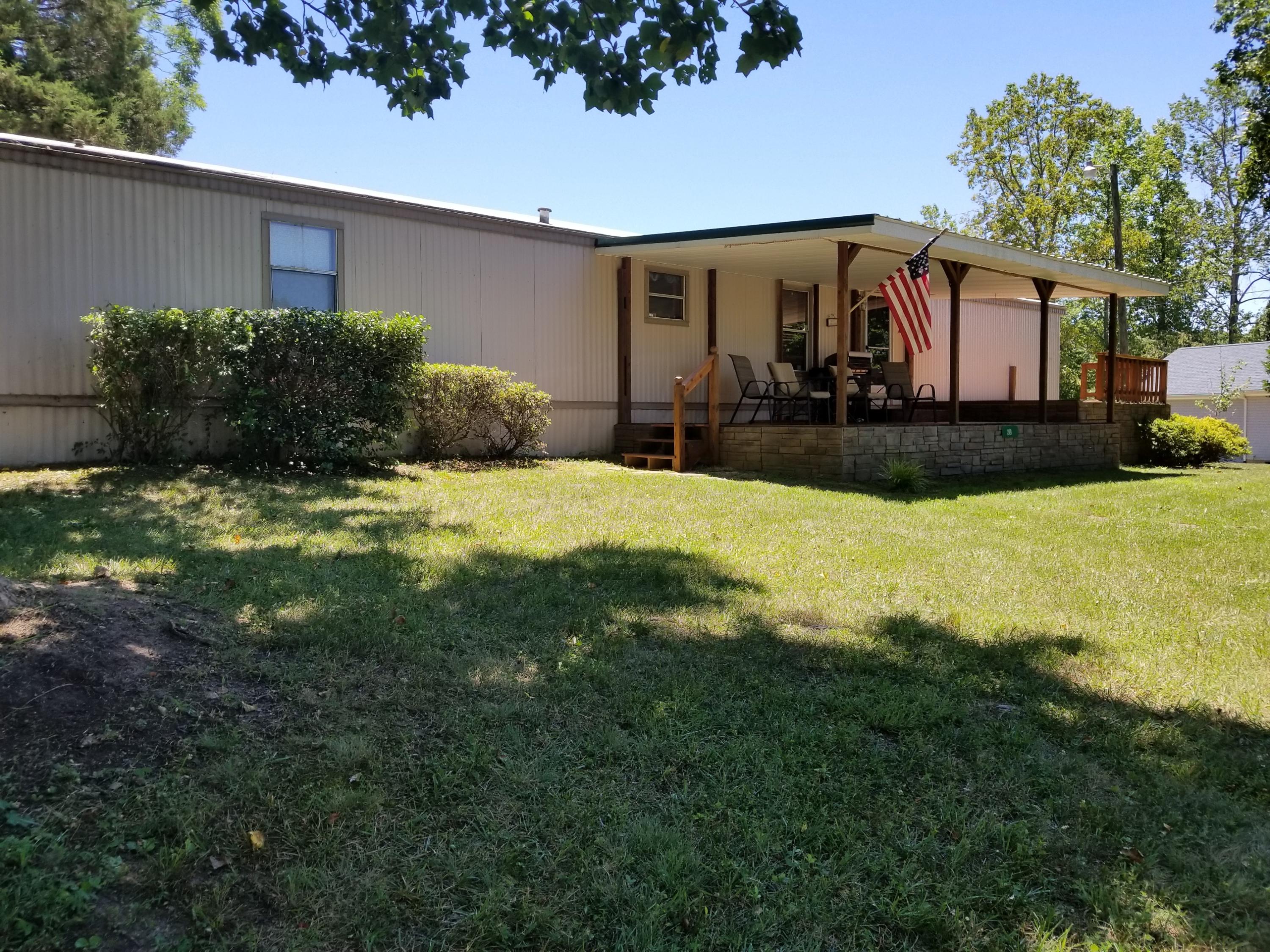 249 Cool Branch Road Penhook, VA 24137 - Photo 3 of 31 a view of a house with a yard