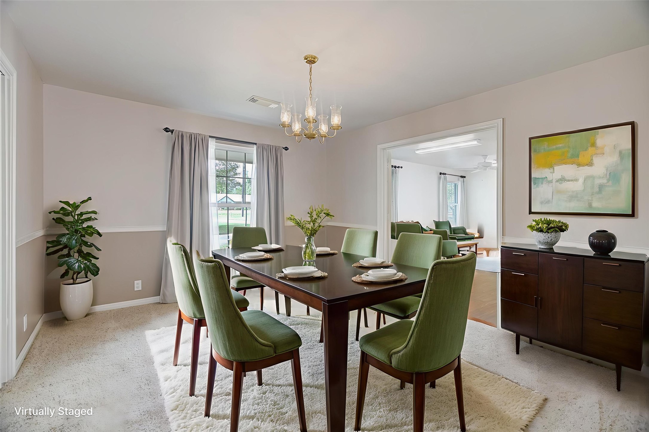 106 Woodland Road Lake Jackson, TX 77566 - Photo 16 of 46 a view of a dining room with furniture and window