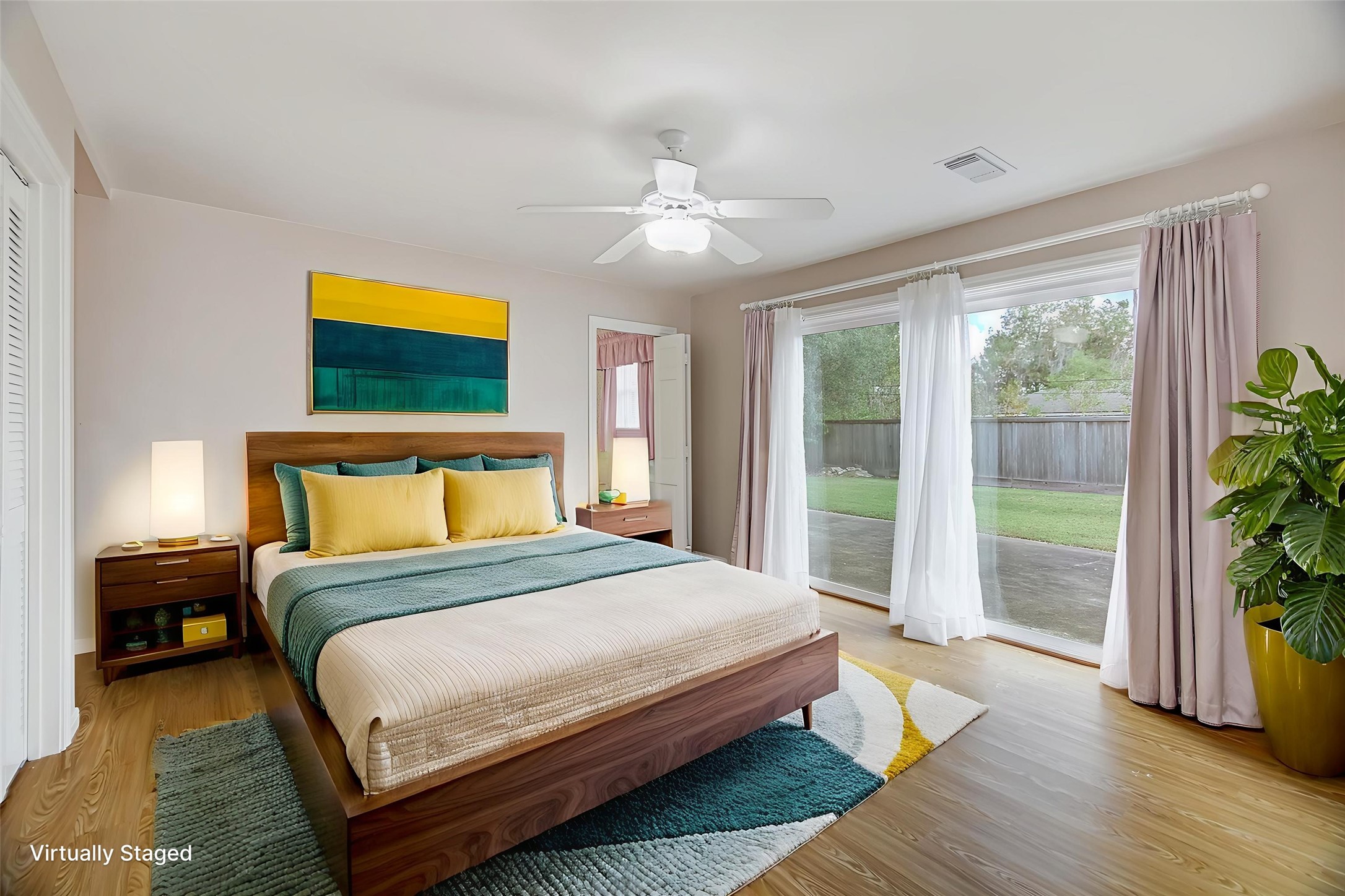 106 Woodland Road Lake Jackson, TX 77566 - Photo 25 of 46 a bedroom with a bed and a large window