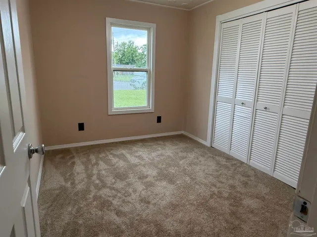 an empty room with a window