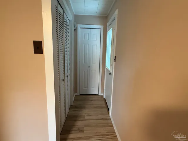 a view of a bathroom with a hallway